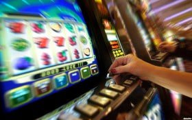 Joker Gaming live blackjack table with dealer, player cards, and betting interface visible on mobile screen